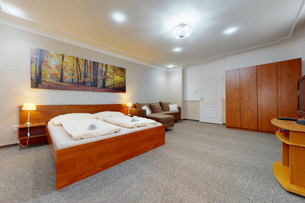 Postel nebo postele na pokoji v ubytování Apartmán Harmónia, Bardejovské kúpele