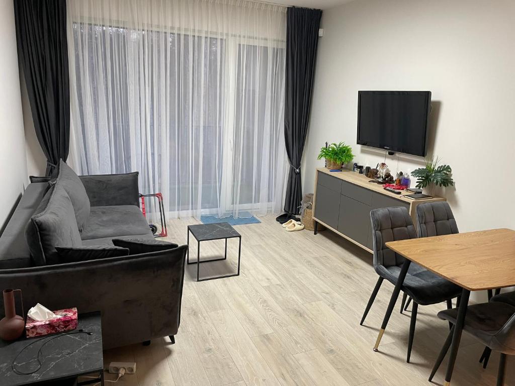 Et tv og/eller underholdning på Relax Mode Apartment