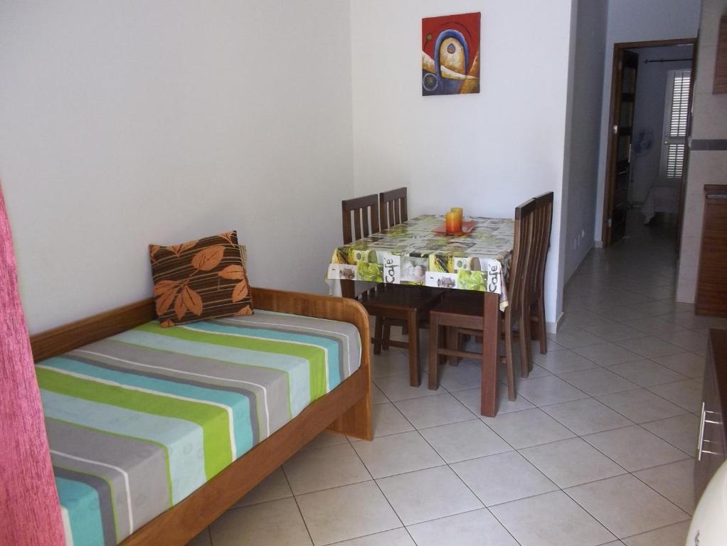 Postel nebo postele na pokoji v ubytování Basic Hotel