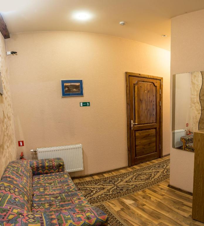 Postel nebo postele na pokoji v ubytování Leo