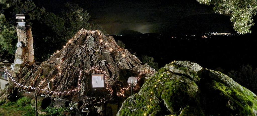 a building with lights on top of a mountain at Rifugio Ortobene in Nuoro