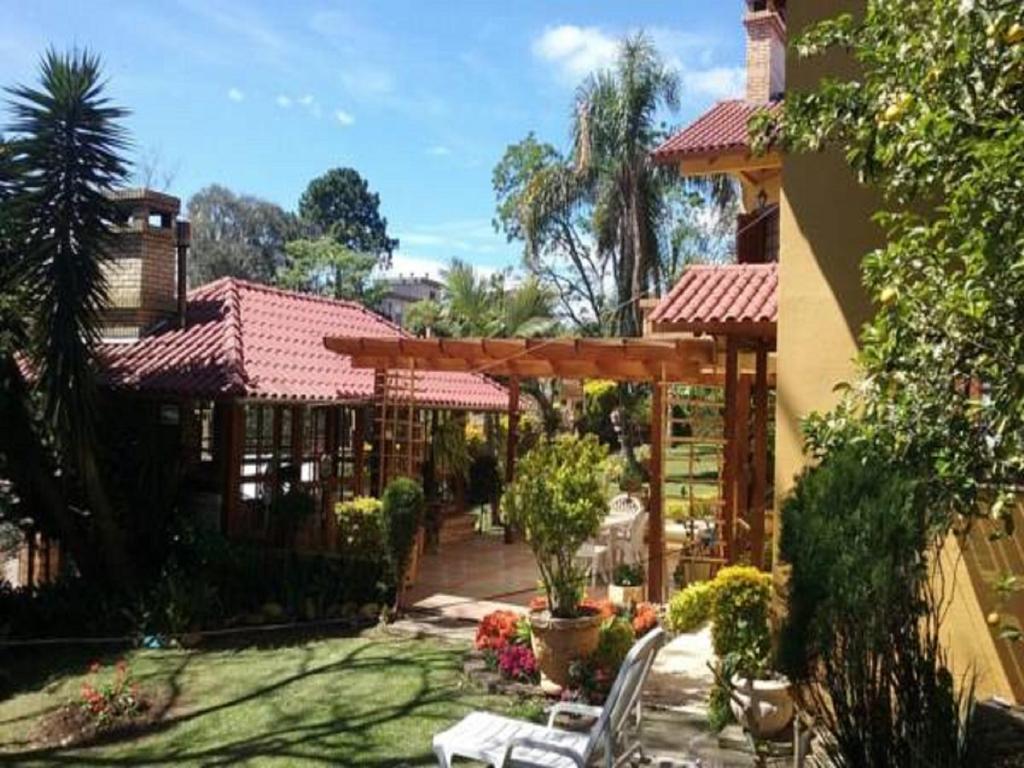  Casa das Palmeiras + Quiosque