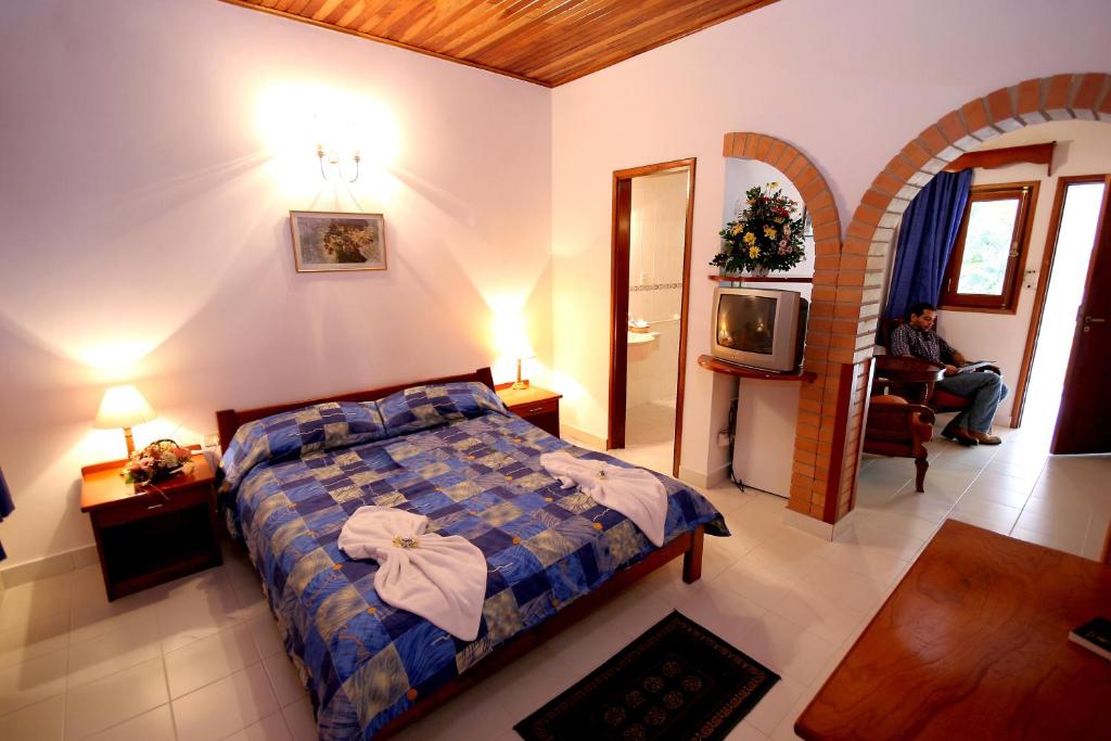 Postelja oz. postelje v sobi nastanitve Hotel Portal del Sol