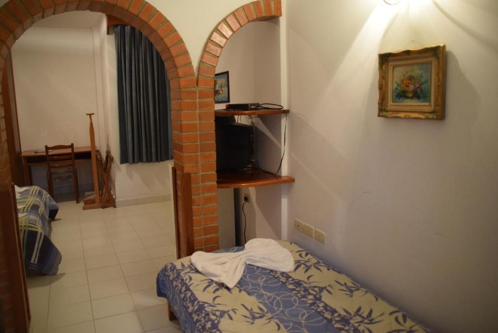 Postelja oz. postelje v sobi nastanitve Hotel Portal del Sol