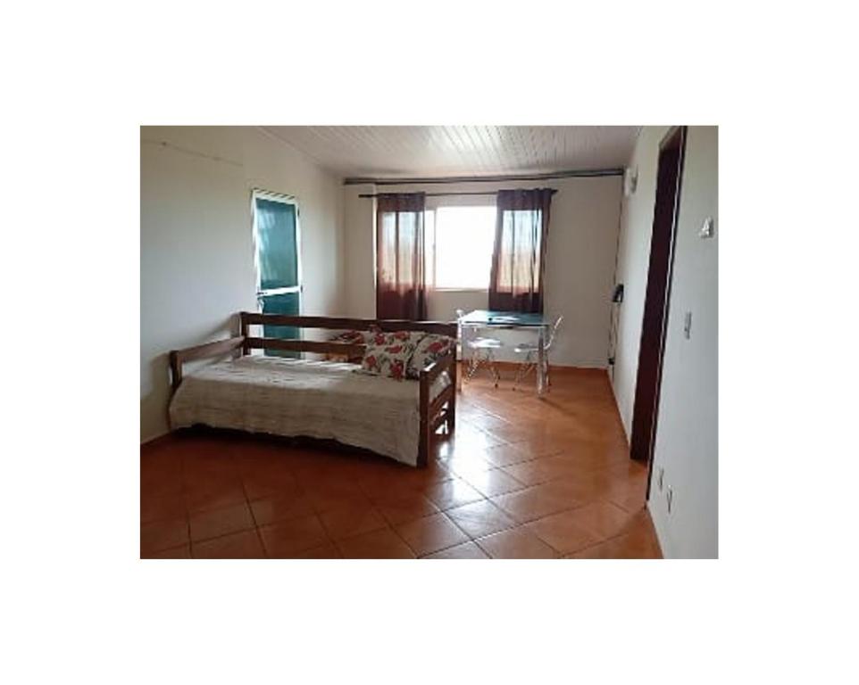 En eller flere senge i et værelse på Apt 3 quartos sendo 1 suíte, zona sul de Ilhéus