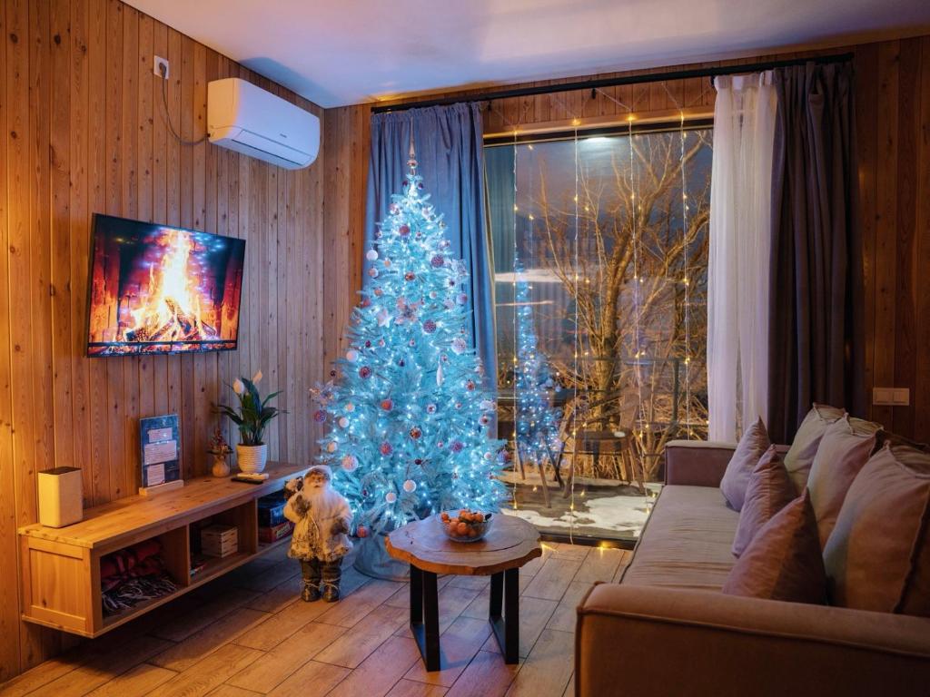 Khu vực ghế ngồi tại AlmaHouse Secluded Mountain Cabins