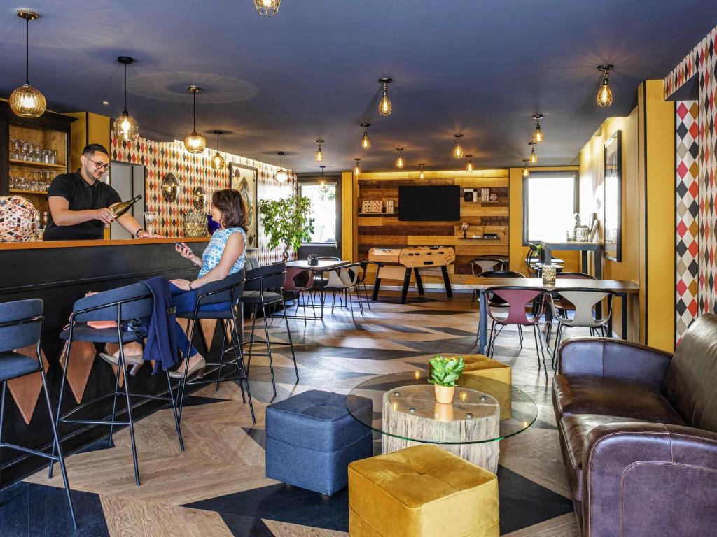 Et opholdsområde på Ibis Styles Reims Centre