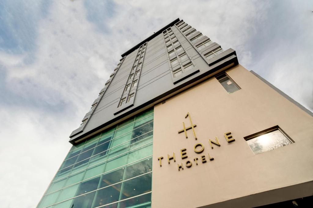 a tall building with the words il mercato on it at Life The One Makassar in Makassar