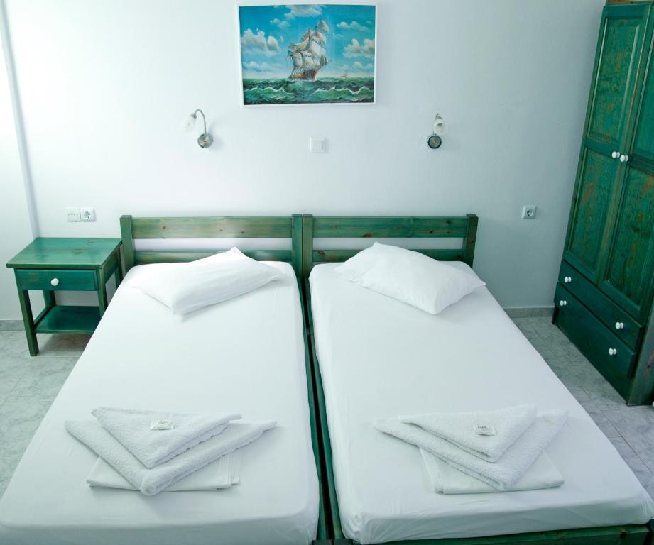 Postel nebo postele na pokoji v ubytování Nicolas Antiparos