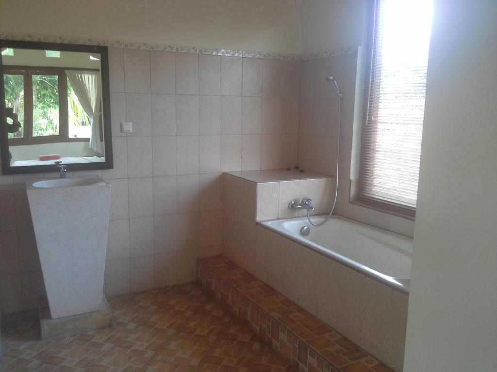 Koupelna v ubytování dewi ayu accomodation