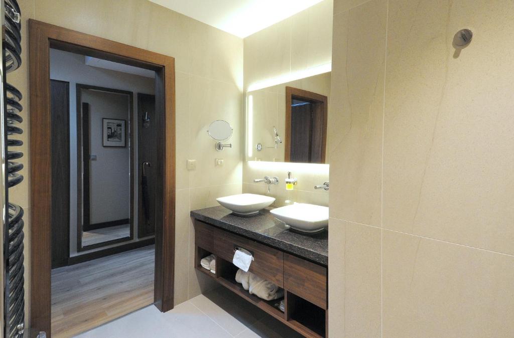 Kuchyň nebo kuchyňský kout v ubytování Hotel Kramer