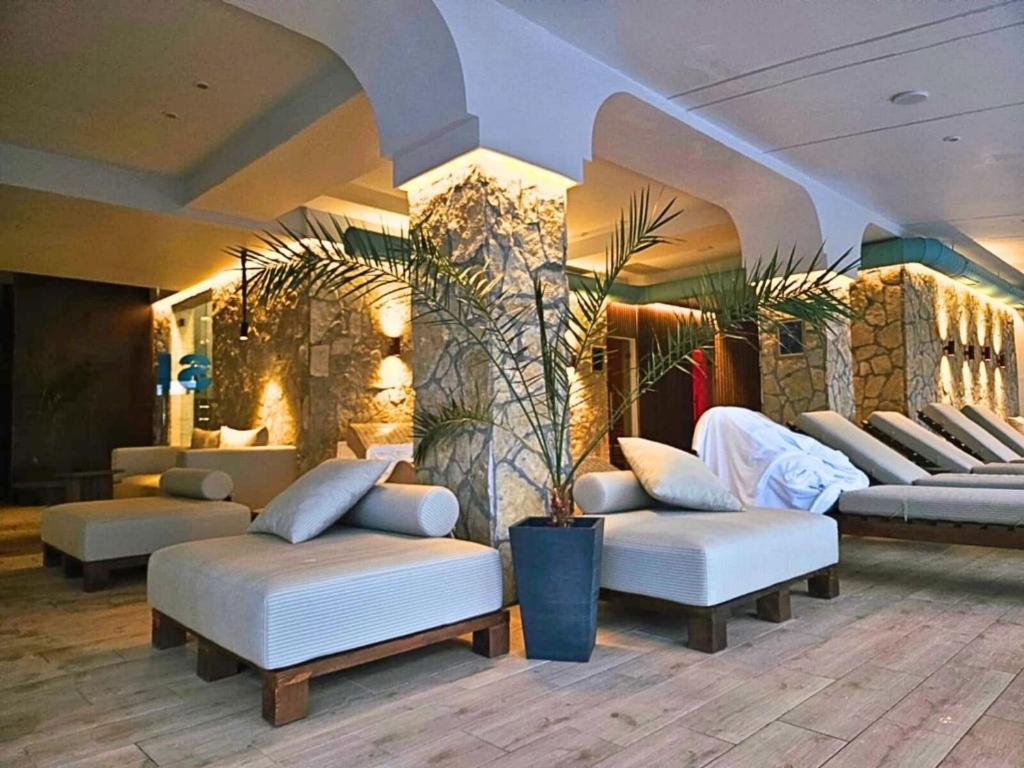 Et opholdsområde på Milmari P87 Apartman