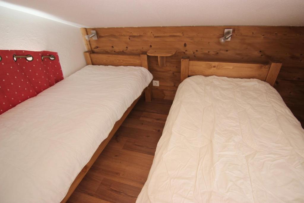 Postel nebo postele na pokoji v ubytování Reine Blanche Appartements VTI
