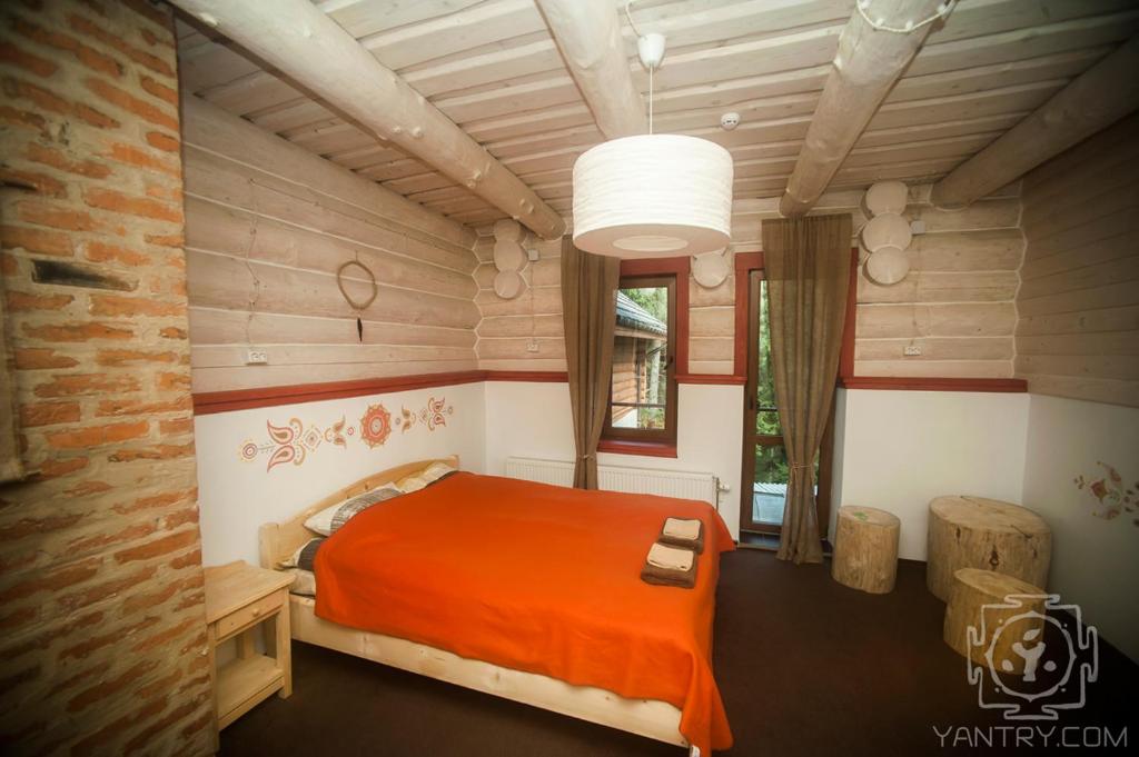 Postel nebo postele na pokoji v ubytování Янтри