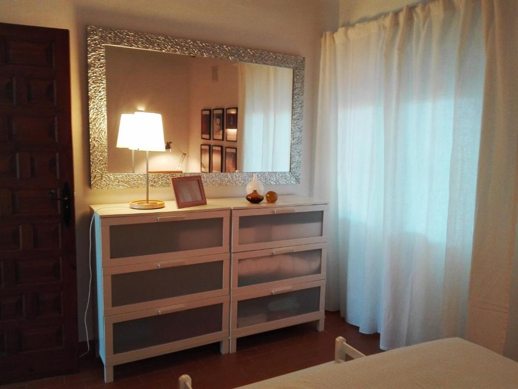 Postel nebo postele na pokoji v ubytování Cristina by Sun & Sea Homes