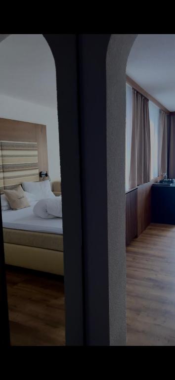 Ein Bett oder Betten in einem Zimmer der Unterkunft Hotel Central