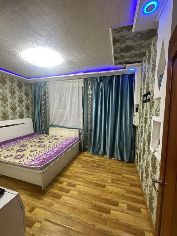 Postel nebo postele na pokoji v ubytování Central Apartment