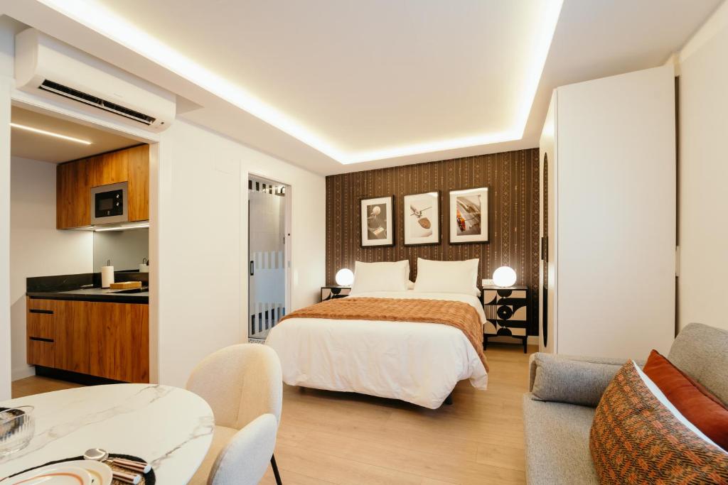 En eller flere senge i et værelse på Fuente H3