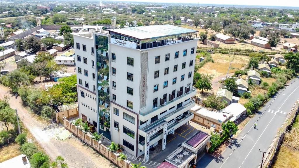 an overhead view of a white building on a city street at `Saala Hotel Limited in Isiolo