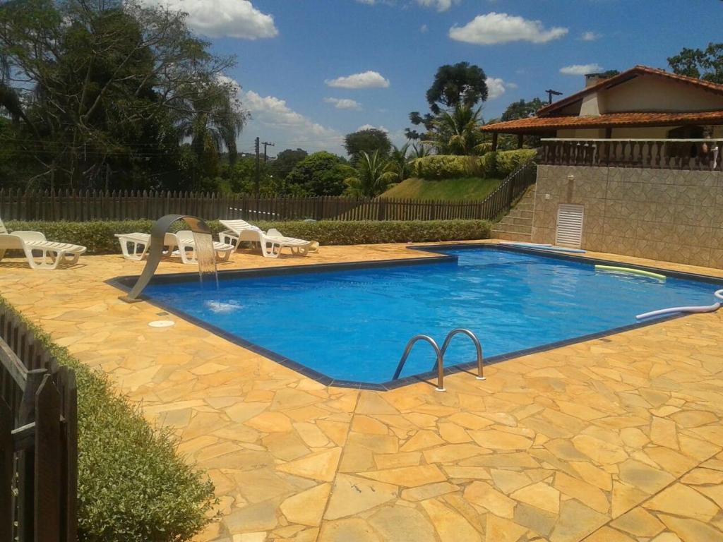 Swimmingpoolen hos eller tæt på Quarto chácara