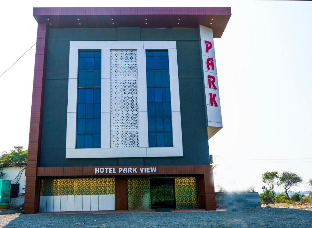a hotelark view building with a sign on it at Hotel Park View in Akolia