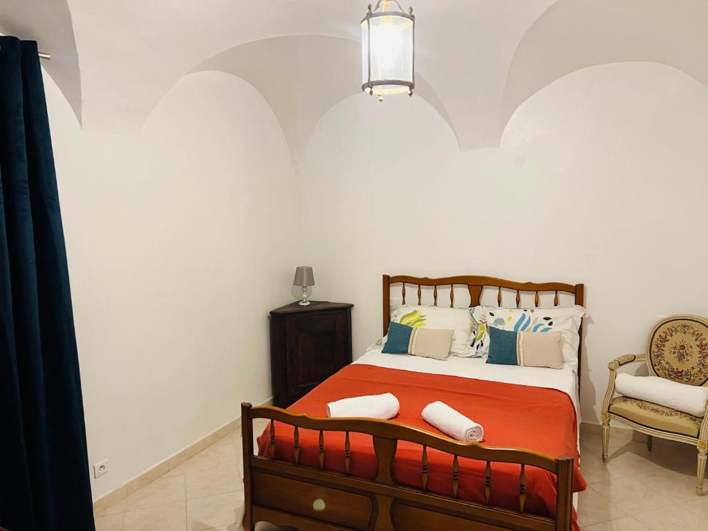 Giường trong phòng chung tại Chez Arlette