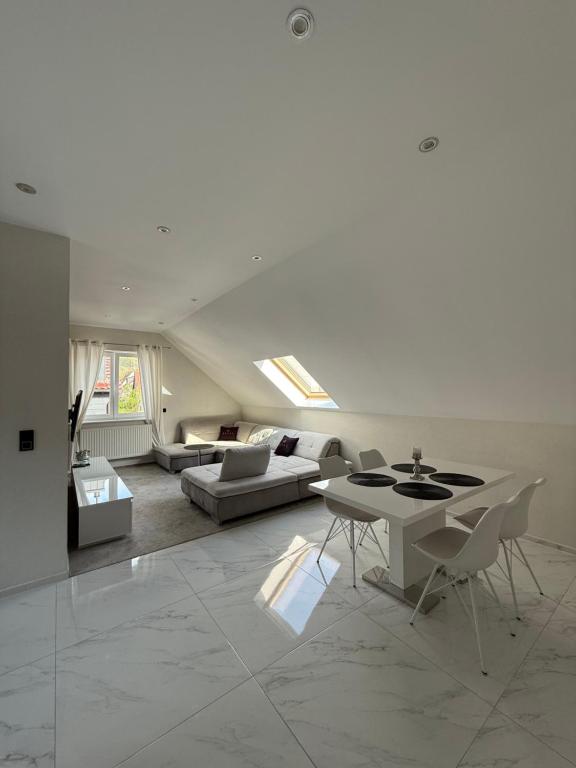 Et opholdsområde på Modernes Apartment in Wald- und Stadtnähe