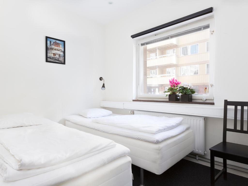 Postel nebo postele na pokoji v ubytování Stockholm Hostel