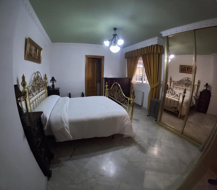 En eller flere senge i et værelse på VillaFilomena