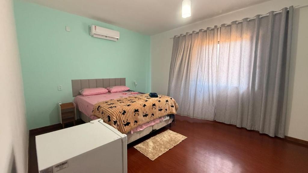 En eller flere senge i et værelse på Casa Shanti Coliving 3