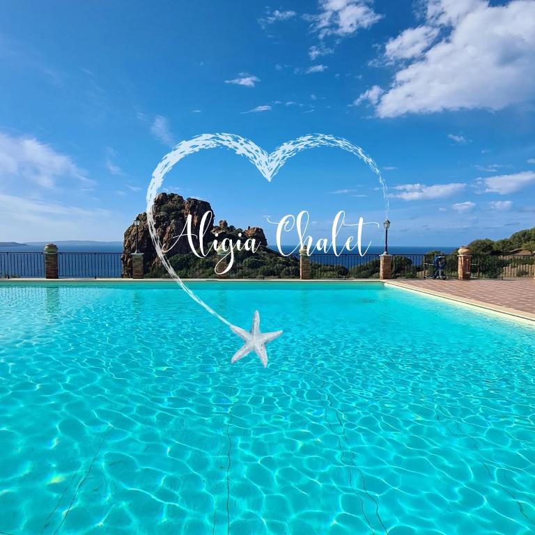 a heart shaped pool with a starfish in the water at Aligia Chalet in Nebida