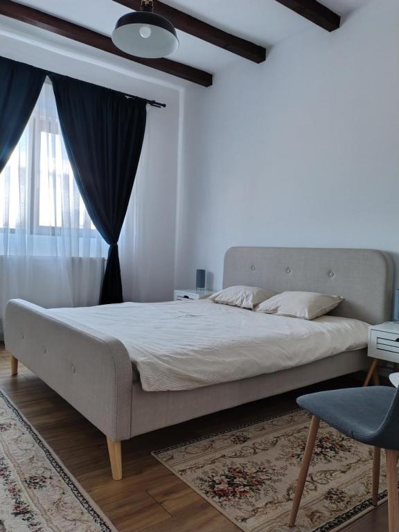 En eller flere senge i et værelse på Family House Pristol