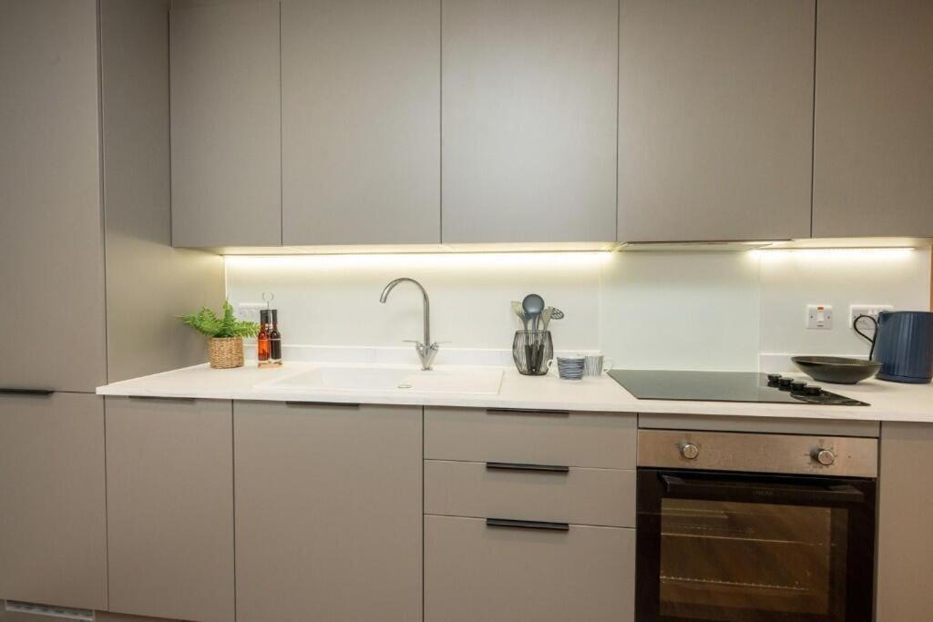 Køkken eller tekøkken på City Centre Apartment