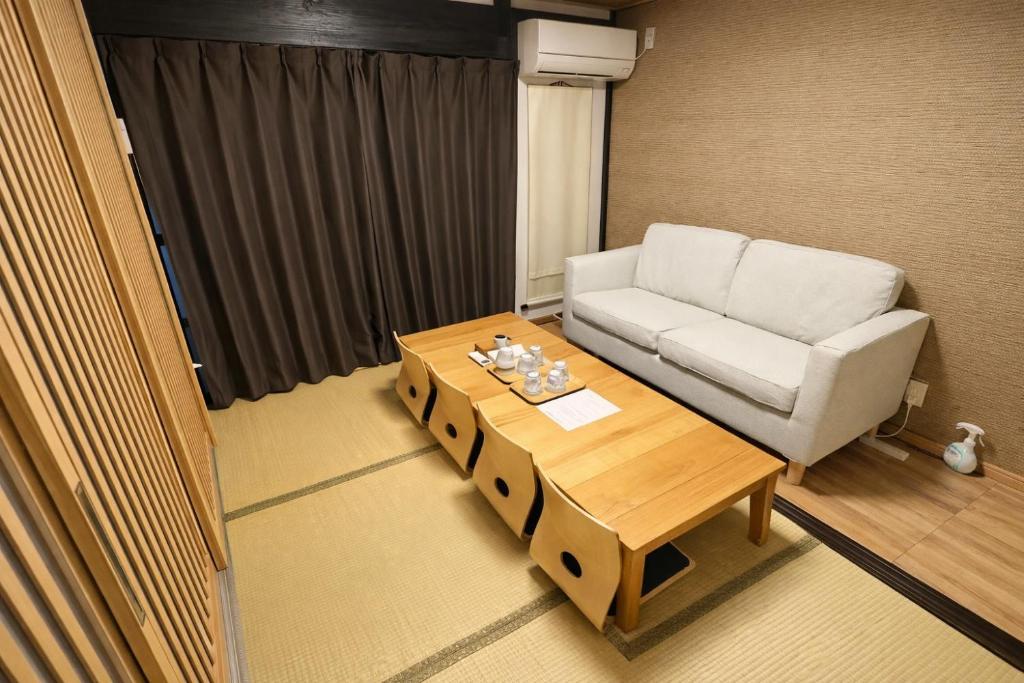 Area soggiorno di 悠然居SR Inn