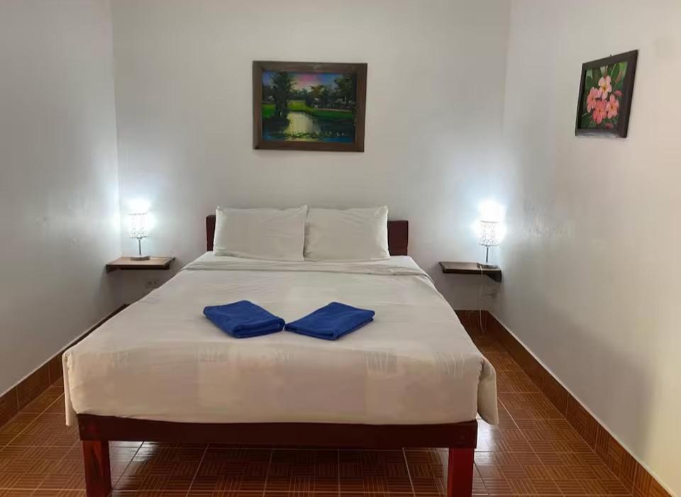 Postel nebo postele na pokoji v ubytování Budget Blue Sapphire