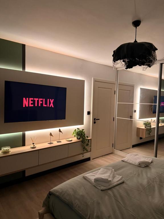 En eller flere senge i et værelse på Sage Studio