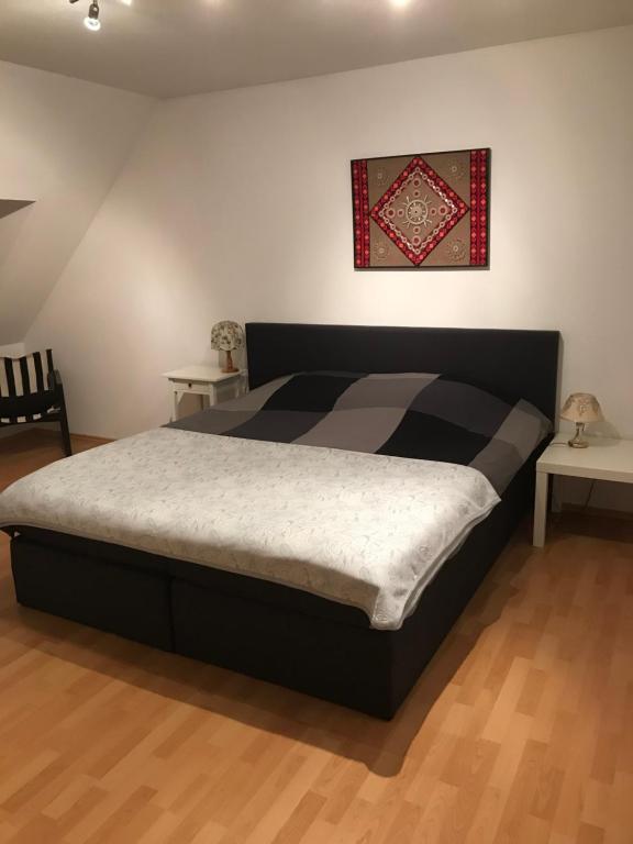 En eller flere senge i et værelse på Doppelzimmer mit eigenem Bad