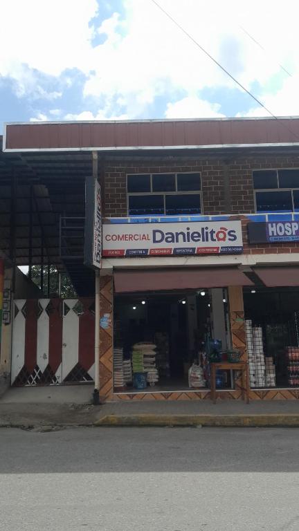 a building with a sign that reads commercial dentists at Apartamento Rural Vacacional in Cotundo