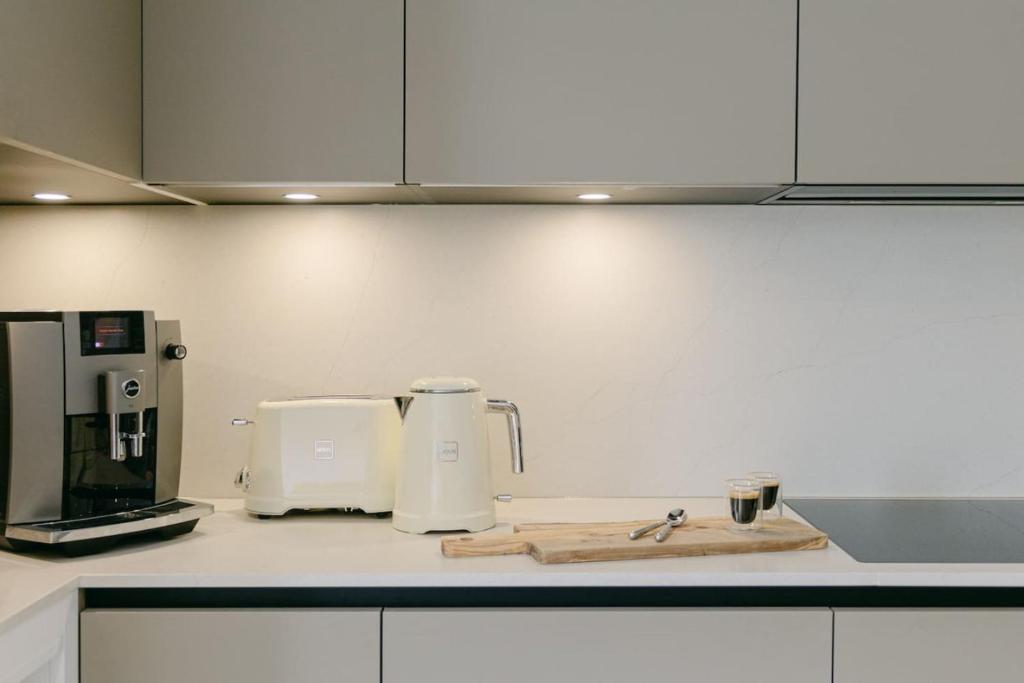 Køkken eller tekøkken på Millihaus Apartment by HomeFlow