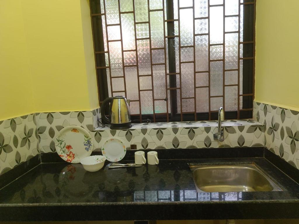 Et badeværelse på One love guest house