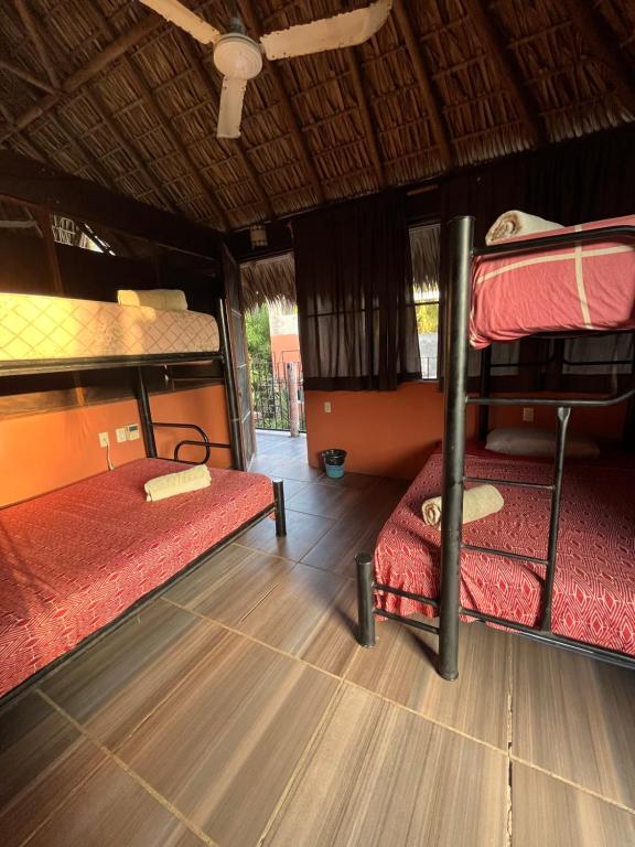 En eller flere senge i et værelse på Casa Nawara