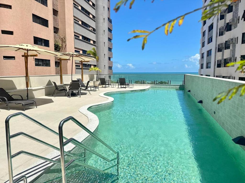 Swimmingpoolen hos eller tæt på Beach Class Exective apto 206