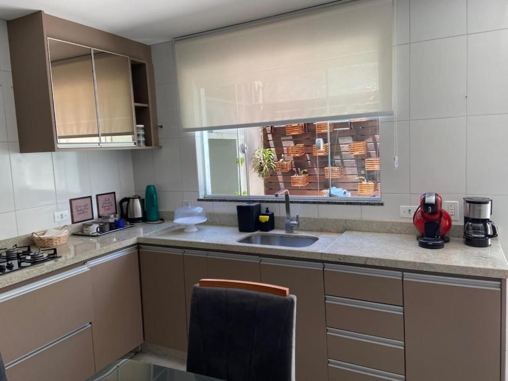 Køkken eller tekøkken på sobrado aconchegante