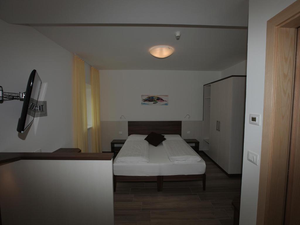Postel nebo postele na pokoji v ubytování Hotel Stampfer B&B