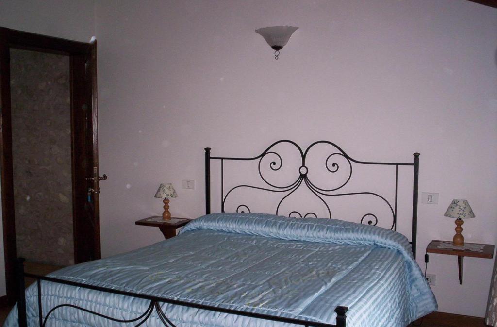Postel nebo postele na pokoji v ubytování B&B Casale Onida