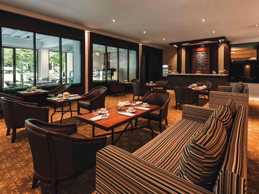 Et opholdsområde på Movenpick Suriwongse Hotel Chiang Mai