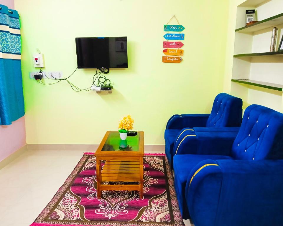 Et tv og/eller underholdning på JAS HOMESTAY MADURAi