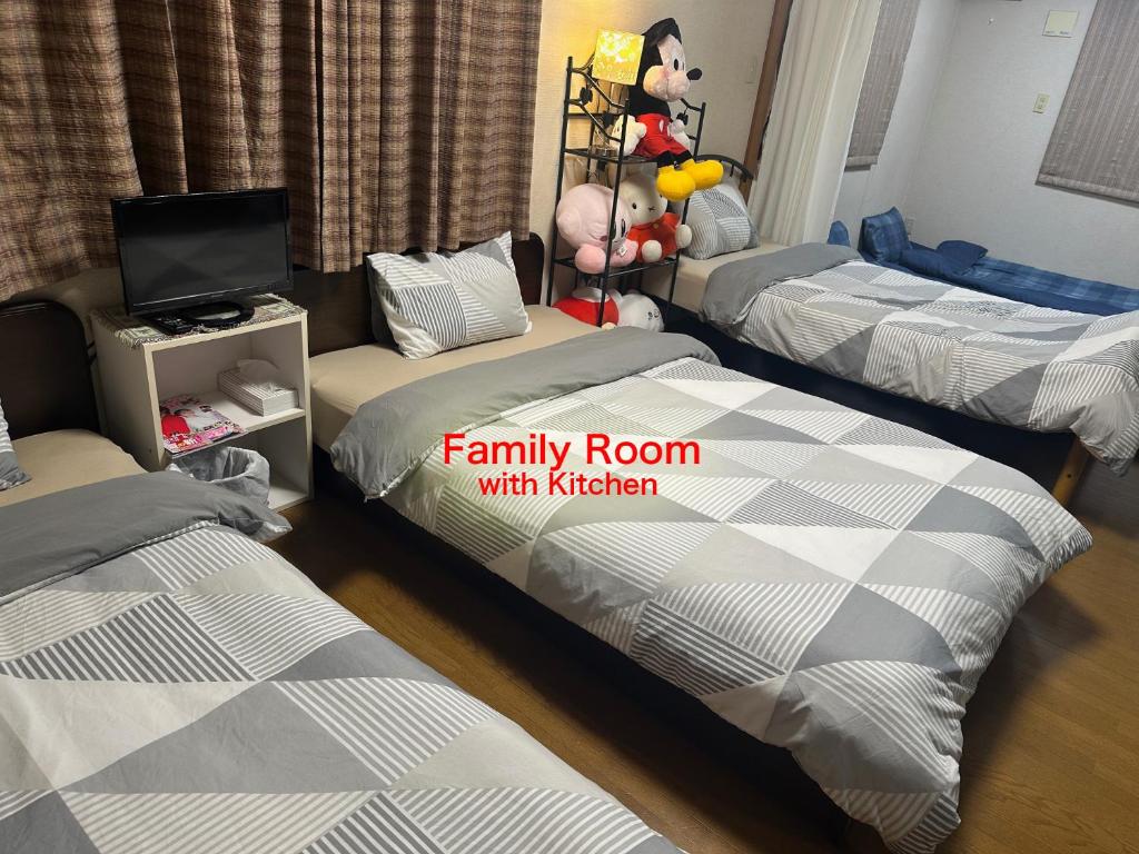 Giường trong phòng chung tại Private Inn Bambee