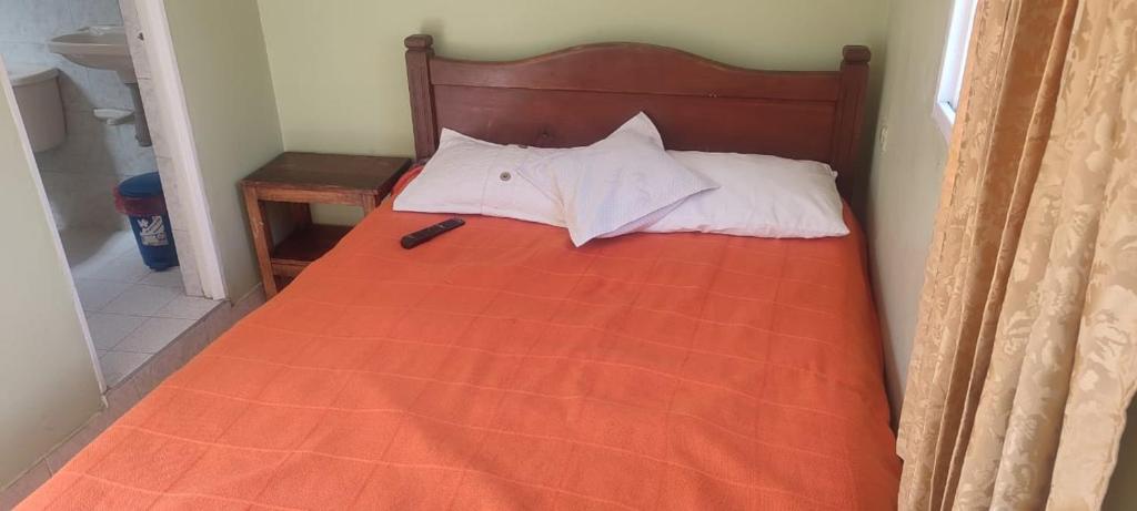 Postel nebo postele na pokoji v ubytování Hotel Villa Vista