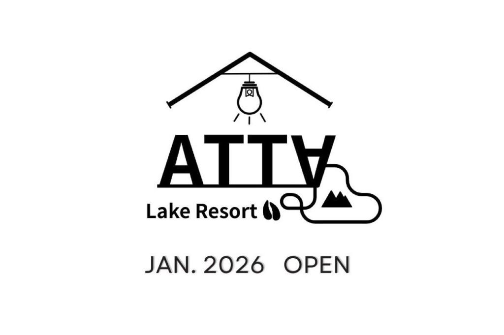 Et logo, certifikat, skilt eller en pris der bliver vist frem på ATTA Toya - Lake Resort